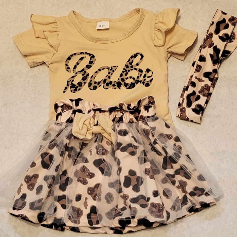 Three piece outfit includes bodysuit, skirt & hair accesory